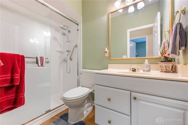 866 Deer Run Rd, Centerville, OH 45459 - bathroom with a stall shower, vanity, and wood finished floors