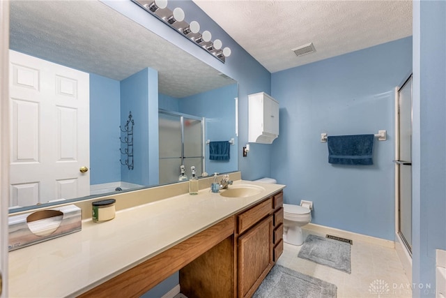 30 Salem Dr, Springboro, OH 45066 - bathroom with a stall shower, vanity, a textured ceiling, and tile patterned flooring