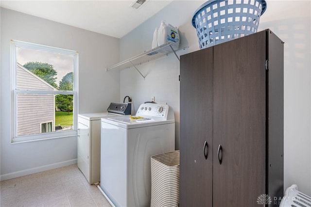 30 Salem Dr, Springboro, OH 45066 - washroom featuring separate washer and dryer and light tile patterned floors