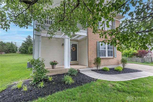 30 Salem Dr, Springboro, OH 45066 - view of front facade featuring brick siding, a front yard, and a porch