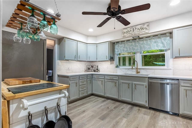 3105 Shadow Hill Rd, Middletown, OH 45042 - kitchen featuring stainless steel dishwasher, gray cabinetry, light countertops, and recessed lighting