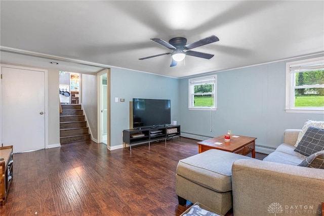 3105 Shadow Hill Rd, Middletown, OH 45042 - living area featuring a baseboard heating unit, baseboard heating, wood finished floors, stairs, and ceiling fan