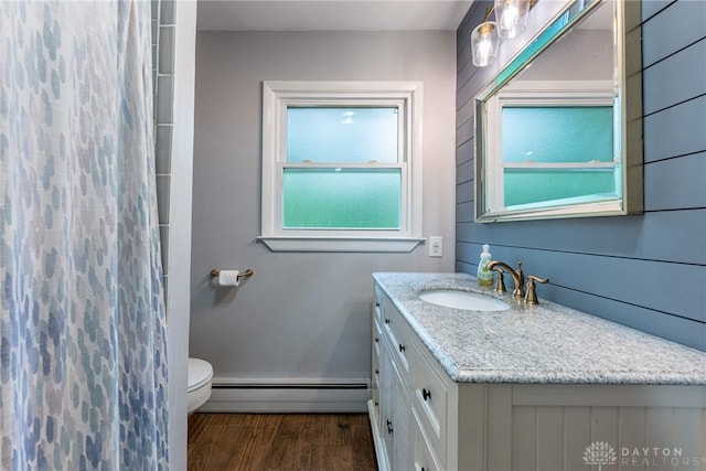 3105 Shadow Hill Rd, Middletown, OH 45042 - bathroom with a baseboard heating unit, vanity, wood finished floors, and a shower with curtain