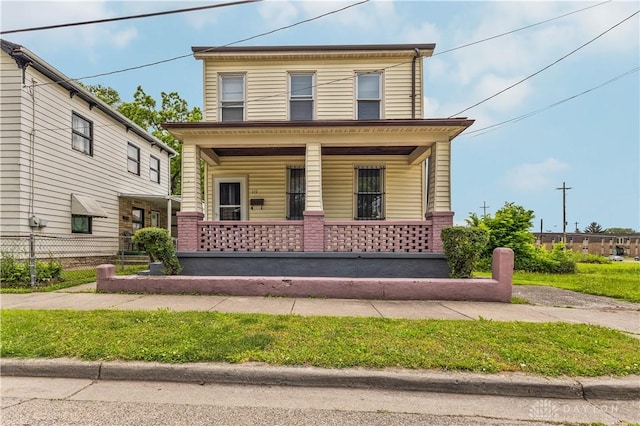 119 Wilson St, Hamilton, OH 45011 - view of front of house with a porch and brick siding