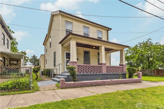 119 Wilson St, Hamilton, OH 45011 - view of front facade with covered porch and a gate