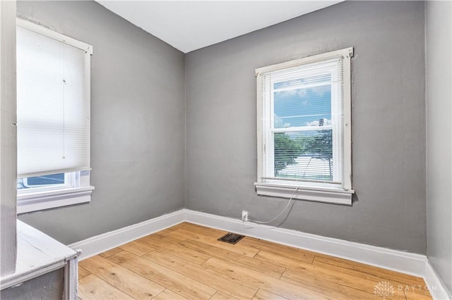 119 Wilson St, Hamilton, OH 45011 - spare room featuring baseboards and light wood-style flooring