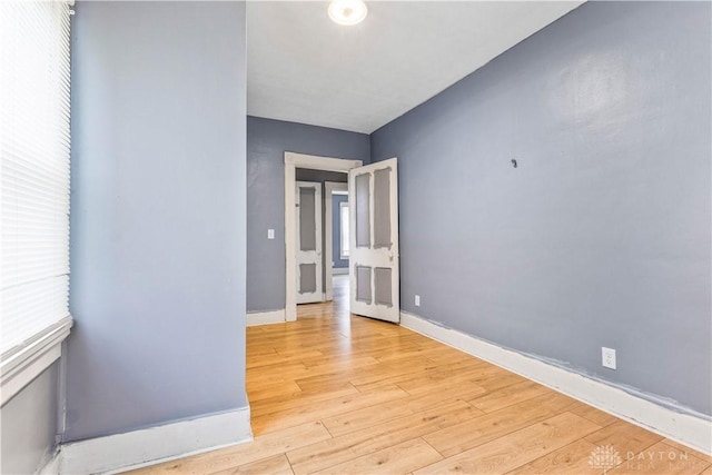 119 Wilson St, Hamilton, OH 45011 - empty room with light wood-type flooring and baseboards