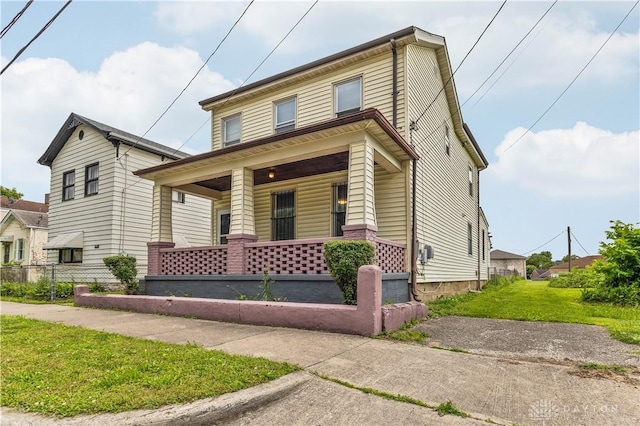119 Wilson St, Hamilton, OH 45011 - view of front of home with a porch and a front lawn