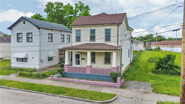 119 Wilson St, Hamilton, OH 45011 - view of front facade featuring a porch