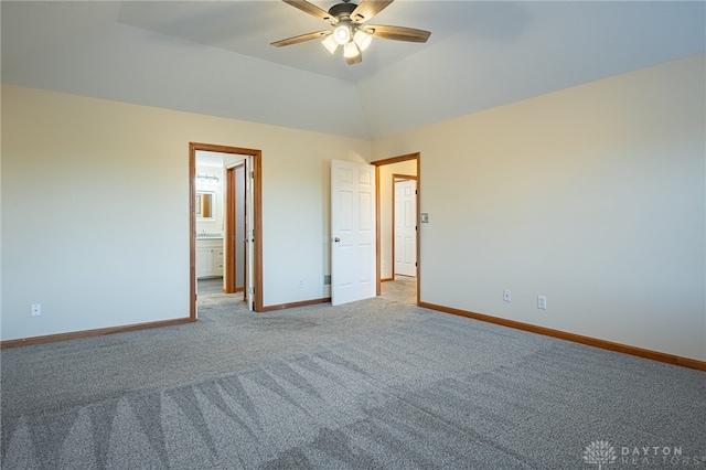 2610 Yorktown Ct, Beavercreek, OH 45434 - unfurnished bedroom featuring light carpet, connected bathroom, and a ceiling fan