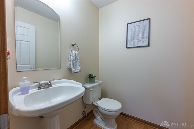2610 Yorktown Ct, Beavercreek, OH 45434 - half bath with wood finished floors and toilet