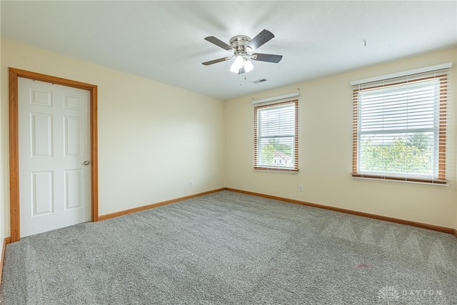 2610 Yorktown Ct, Beavercreek, OH 45434 - carpeted spare room with baseboards and ceiling fan