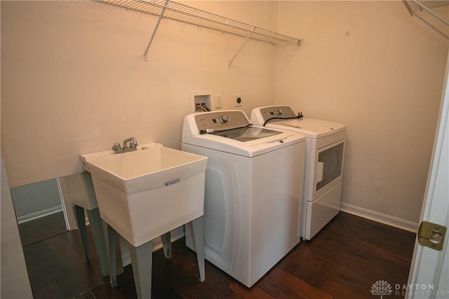 2710 Zoellners Way, Fairfield Twp, OH 45011 - laundry room featuring separate washer and dryer and dark wood-style floors
