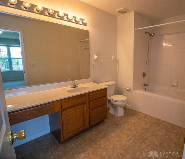 2710 Zoellners Way, Fairfield Twp, OH 45011 - bathroom featuring vanity, tiled shower / bath, and a textured ceiling