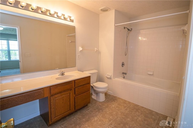 2710 Zoellners Way, Fairfield Twp, OH 45011 - full bathroom featuring tiled shower / bath combo, vanity, and a textured ceiling