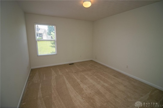 2710 Zoellners Way, Fairfield Twp, OH 45011 - empty room with light colored carpet and a textured ceiling