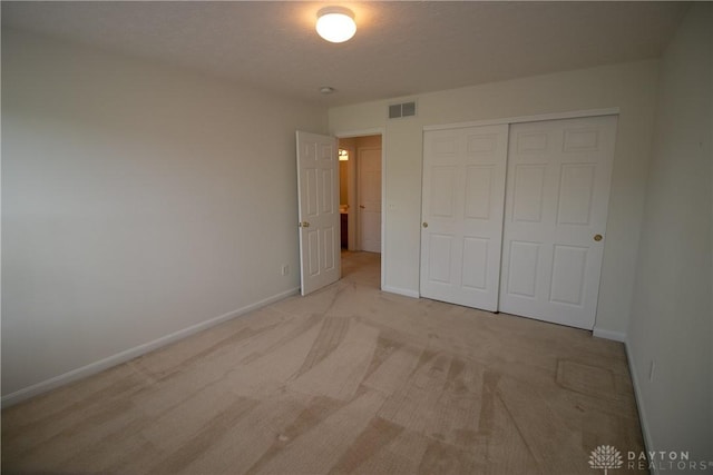 2710 Zoellners Way, Fairfield Twp, OH 45011 - unfurnished bedroom featuring a closet and light carpet