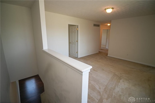 2710 Zoellners Way, Fairfield Twp, OH 45011 - unfurnished room featuring light carpet and baseboards