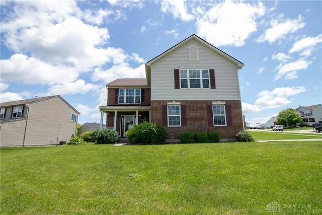 2710 Zoellners Way, Fairfield Twp, OH 45011 - traditional home with brick siding and a front lawn