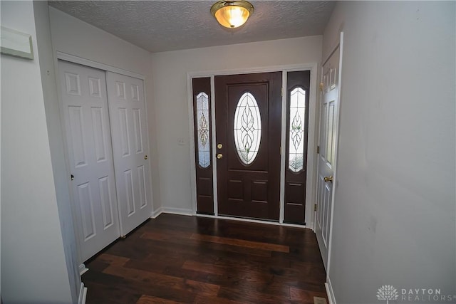 2710 Zoellners Way, Fairfield Twp, OH 45011 - entrance foyer with dark wood-style floors and a textured ceiling