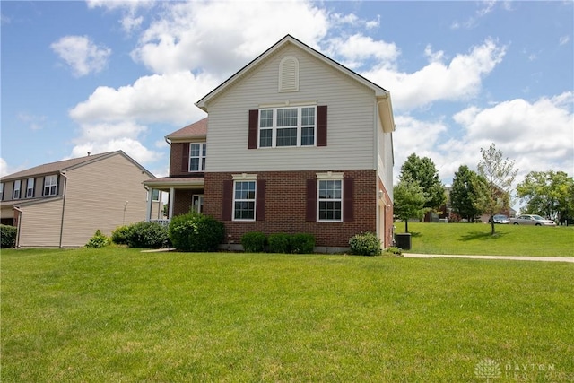 2710 Zoellners Way, Fairfield Twp, OH 45011 - traditional-style house with brick siding and a front lawn