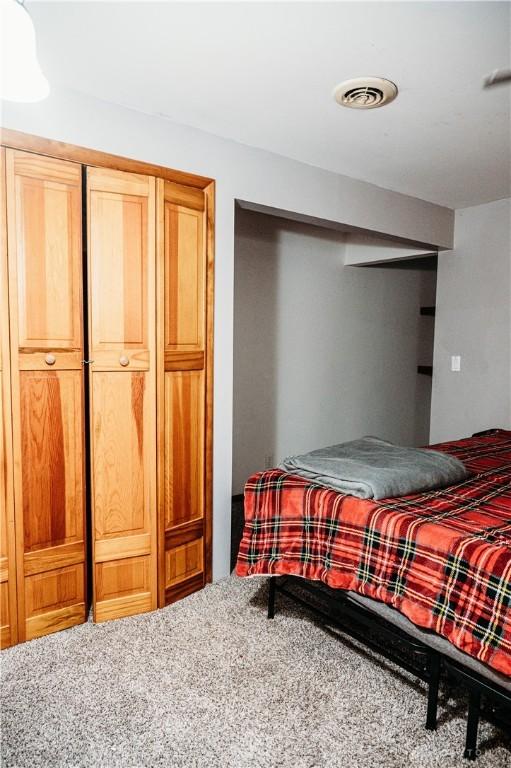 916 Wilson Rd, Troy, OH 45373 - bedroom featuring carpet flooring