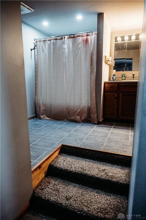 916 Wilson Rd, Troy, OH 45373 - full bath with vanity and a shower with curtain