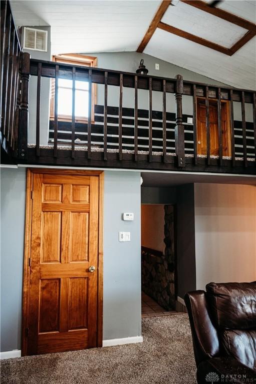 916 Wilson Rd, Troy, OH 45373 - kitchen featuring lofted ceiling and carpet