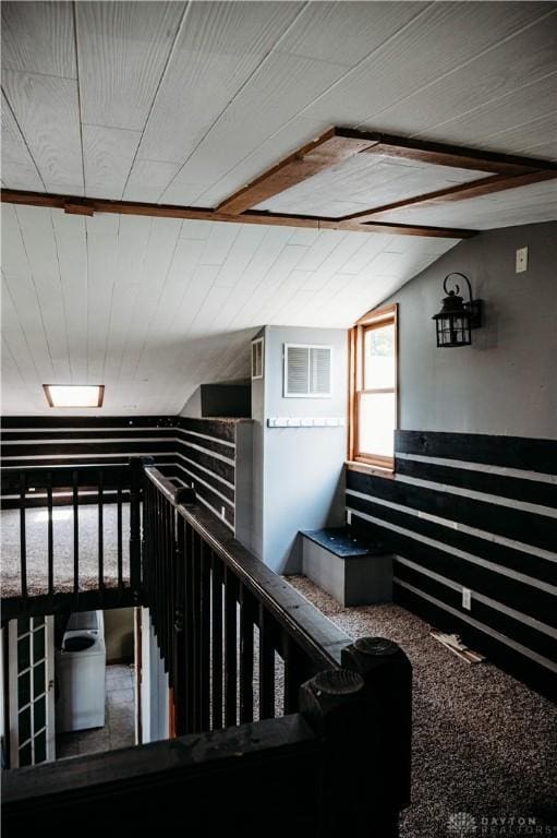 916 Wilson Rd, Troy, OH 45373 - hall featuring lofted ceiling, carpet, and an upstairs landing