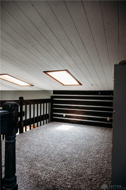 916 Wilson Rd, Troy, OH 45373 - additional living space with carpet floors and a skylight