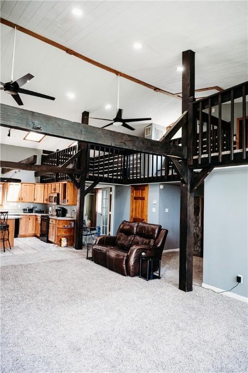 916 Wilson Rd, Troy, OH 45373 - living area with a ceiling fan, light carpet, recessed lighting, and high vaulted ceiling