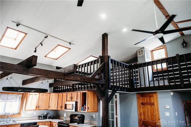 916 Wilson Rd, Troy, OH 45373 - back of house featuring a ceiling fan and a sink