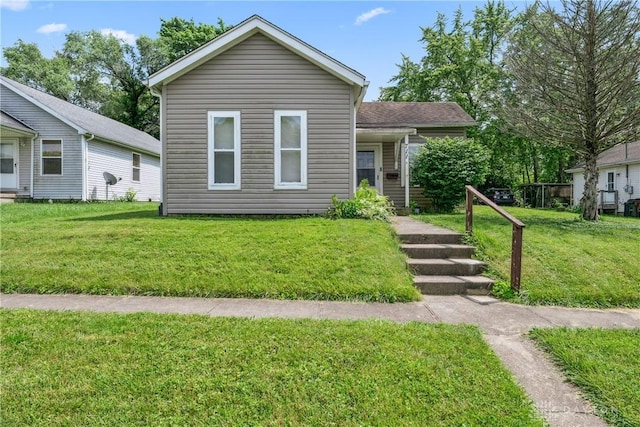 711 E 2nd St, Xenia, OH 45385 - view of front of property featuring a front yard