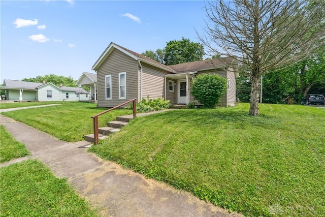 711 E 2nd St, Xenia, OH 45385 - single story home featuring a front lawn