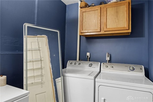 711 E 2nd St, Xenia, OH 45385 - laundry room with washer and dryer and cabinet space