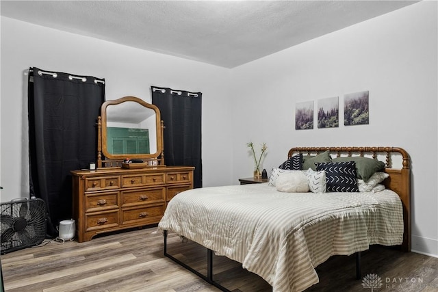 711 E 2nd St, Xenia, OH 45385 - bedroom featuring wood finished floors