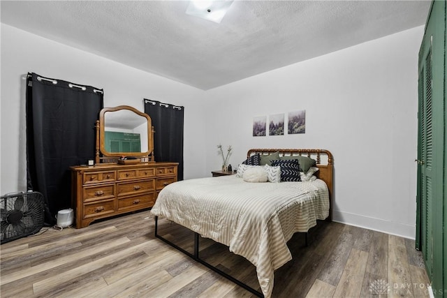 711 E 2nd St, Xenia, OH 45385 - bedroom with wood finished floors and baseboards