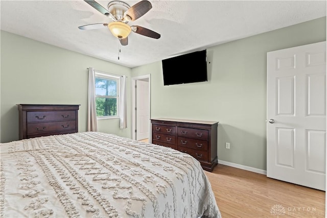 416 Bent Twig Dr, Vandalia, OH 45377 - bedroom with light wood-style flooring and ceiling fan