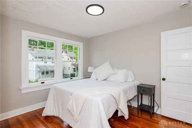 331 Illinois Ave, Dayton, OH 45410 - bedroom featuring wood finished floors and baseboards