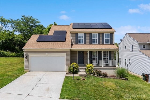110 Easton Manor Dr, Monroe, OH 45050 - view of front of property with covered porch, roof mounted solar panels, driveway, an attached garage, and a front yard