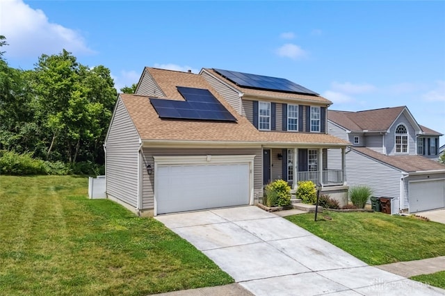110 Easton Manor Dr, Monroe, OH 45050 - traditional-style home featuring a porch, solar panels, concrete driveway, and a front lawn