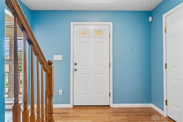 110 Easton Manor Dr, Monroe, OH 45050 - entryway with light wood-style flooring and stairway