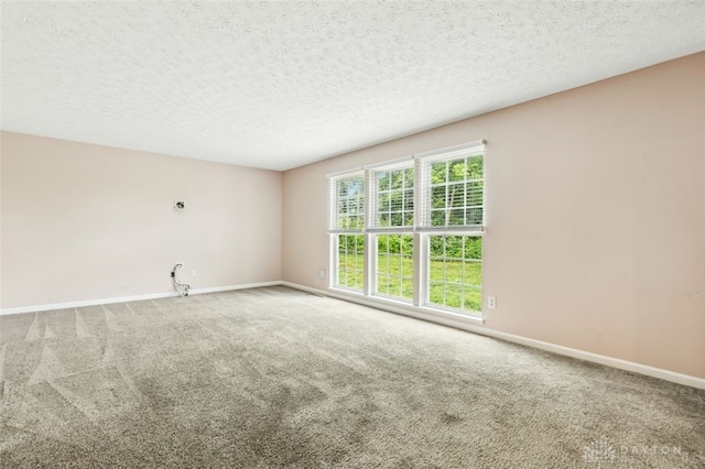 110 Easton Manor Dr, Monroe, OH 45050 - spare room with carpet floors and a textured ceiling