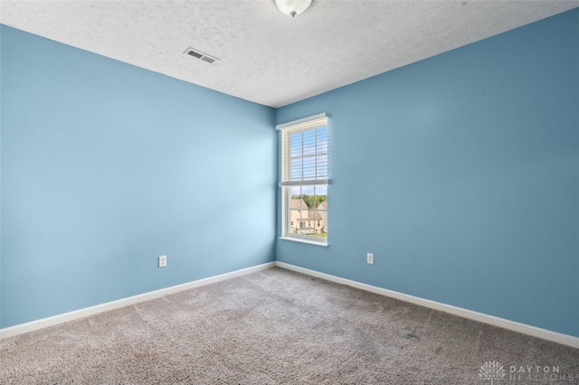 110 Easton Manor Dr, Monroe, OH 45050 - carpeted empty room featuring baseboards and a textured ceiling