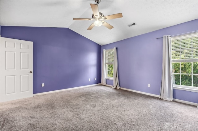 110 Easton Manor Dr, Monroe, OH 45050 - carpeted spare room featuring a ceiling fan, vaulted ceiling, and healthy amount of natural light