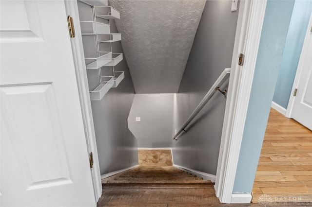 110 Easton Manor Dr, Monroe, OH 45050 - stairs featuring wood finished floors and a textured ceiling
