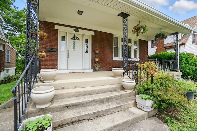2344 Quatman Ave, Norwood, OH 45212 - doorway to property featuring brick siding and a porch