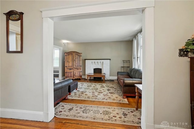 2344 Quatman Ave, Norwood, OH 45212 - living area featuring wood finished floors and a fireplace