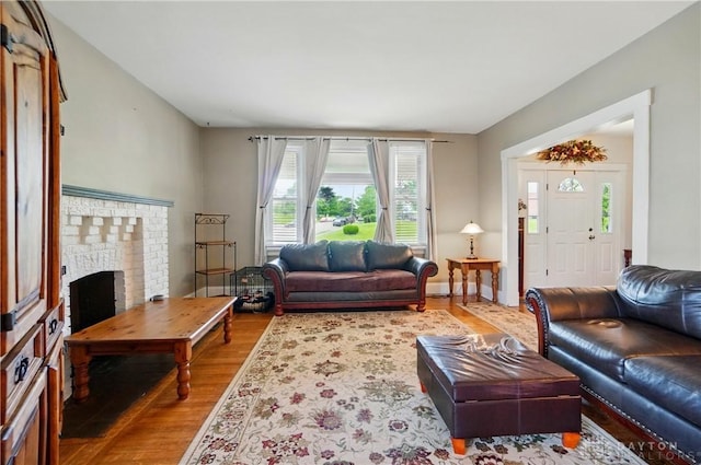 2344 Quatman Ave, Norwood, OH 45212 - living area featuring wood finished floors and a fireplace