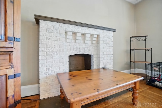 2344 Quatman Ave, Norwood, OH 45212 - dining room with wood finished floors and a brick fireplace